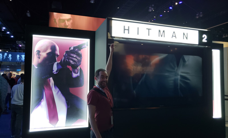Here's me trying my best to draw an "S" on the Hitman 2 display, only I was too short to pull it off. Dangit, I knew I should've brought my prank stool to E3!