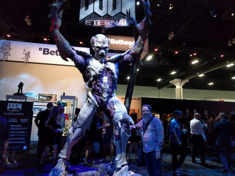 Next we headed to Bethesda's booth, which featured a giant statue for Doom Eternal. Notice Cork's expert hover hand technique – clearly he's taken pictures with demons before.